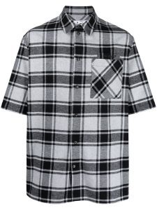 How to dress up in a black and white checkered shirt?